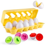 Eivormig educatief speelgoed voor kinderen met gele mand en gekleurde vormen