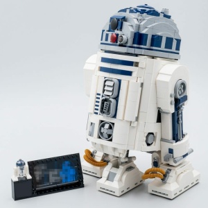 R2D2-robot om te bouwen met witte en blauwe Lego-achtige blokken