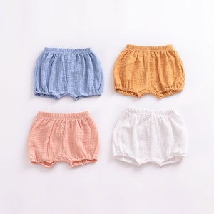 Geplooide linnen shorts voor kinderen in oranje, wit, blauw en roze