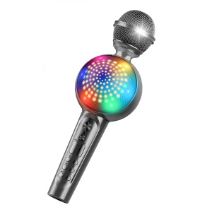 Een grijze draadloze karaokemicrofoon voor kinderen met een veelkleurige middenluidspreker
