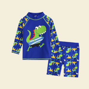 kindertrui, blauw, met dinosaurusmotief erop, bestaande uit een T-shirt met lange mouwen en een korte broek